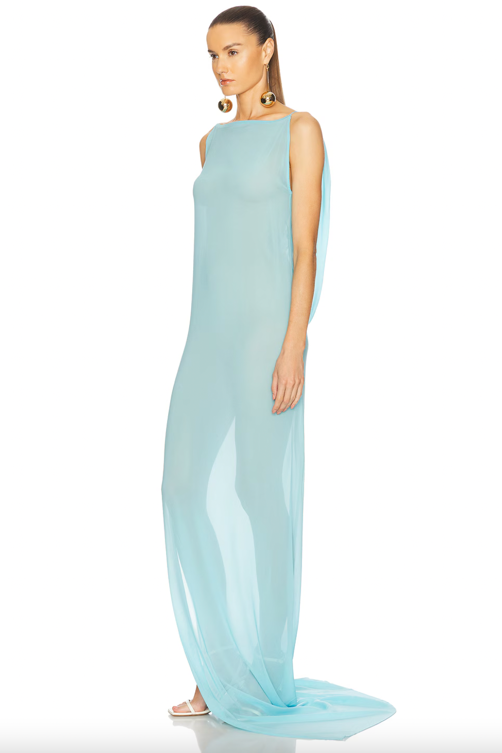 The Ameno features a delicate silk chiffon construction that feels incredibly lightweight and airy. Its design includes a graceful hanging drape along the back, complemented by an elegant train that flows fluidly, enhancing movement with a natural, water-like effect. This sophisticated silhouette is ideal for those seeking refined elegance combined with effortless grace.