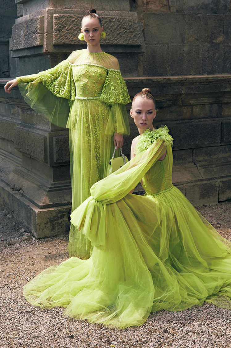 Indulge in luxury with the Nori Gown. Twirl and turn heads in this stunning layered gown boasting 3D embroidered lace, delicate beading, and dramatic ruffled long sleeves. Its flowy upper skirt and soft tulle add vibrancy and movement, while the jeweled rounded neckline and hidden back zipper/clasp exude sophistication.