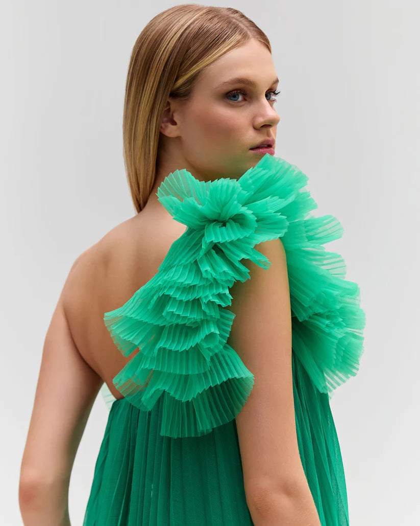 Elevate your style with the Pleated One Shoulder Gown. Made from luxurious pleated chiffon, this dress features a dramatic one shoulder neckline, adding a touch of glamour to your look. Be a part of the Spring 2024 Runway Collection and make a statement at your next event. Fully lined for maximum comfort.