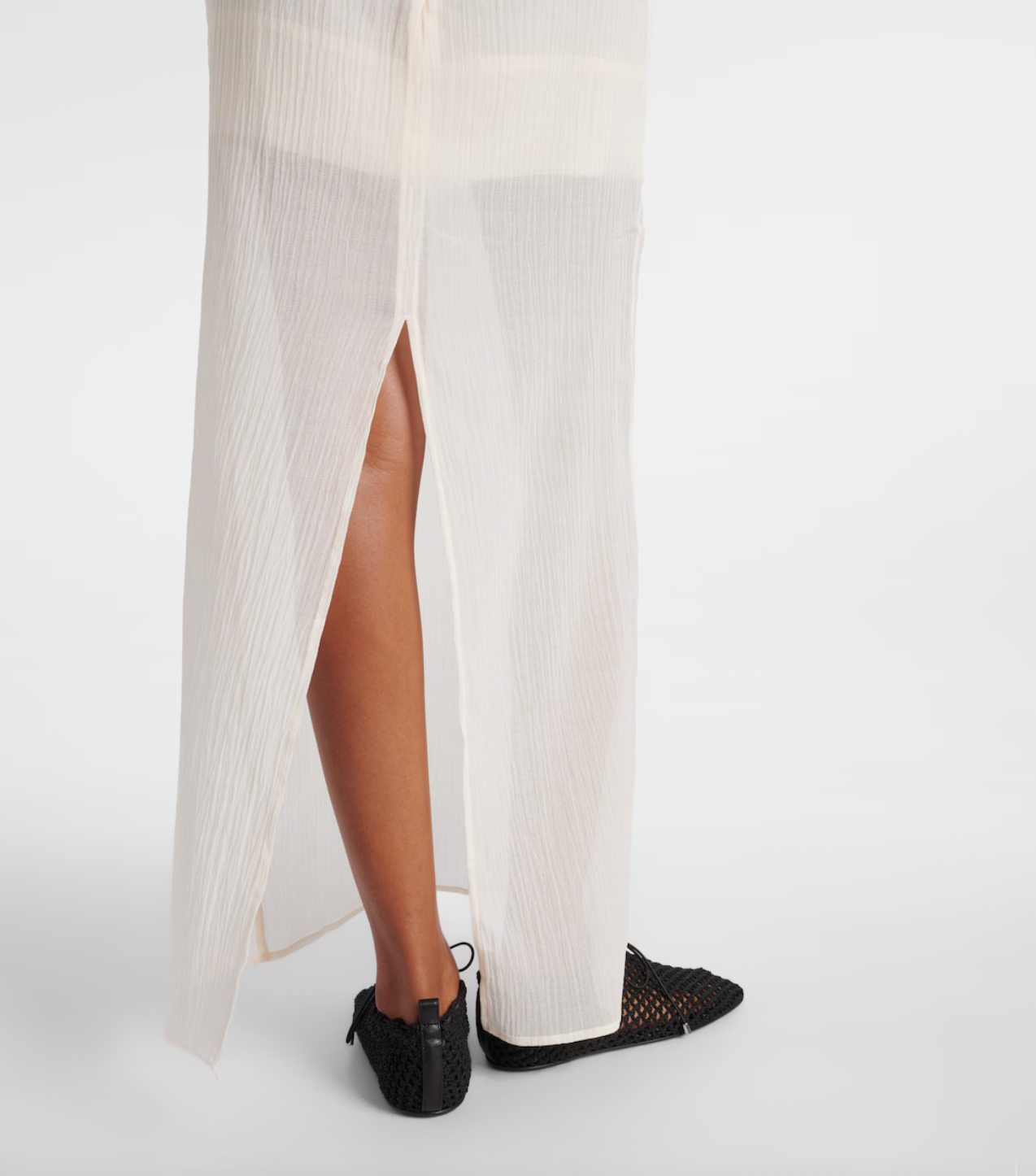 Embrace effortless elegance with this Cotton and Silk Maxi Dress from Toteme. Featuring a blend of soft cotton and luxurious silk, its semi-sheer top layer adds a subtle, modern allure. Designed as a contemporary uniform piece, this dress elevates your wardrobe with timeless style and refined comfort, perfect for defining your dress code with confidence.