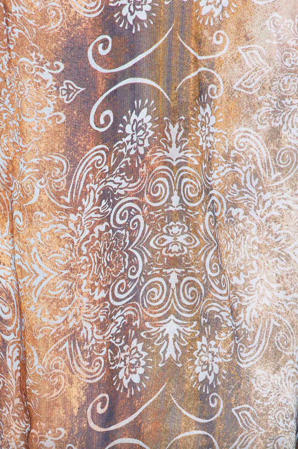 Indulge in luxury with the Bec + Bridge Malaya Mini Dress. This exquisite dress boasts a delicate print, a plunging V-neckline, and a bold open-back halter-style design. Its adjustable wrap skirt and dangling ties offer a touch of elegance to the relaxed A-line silhouette. Elevate your style with this exclusive piece.