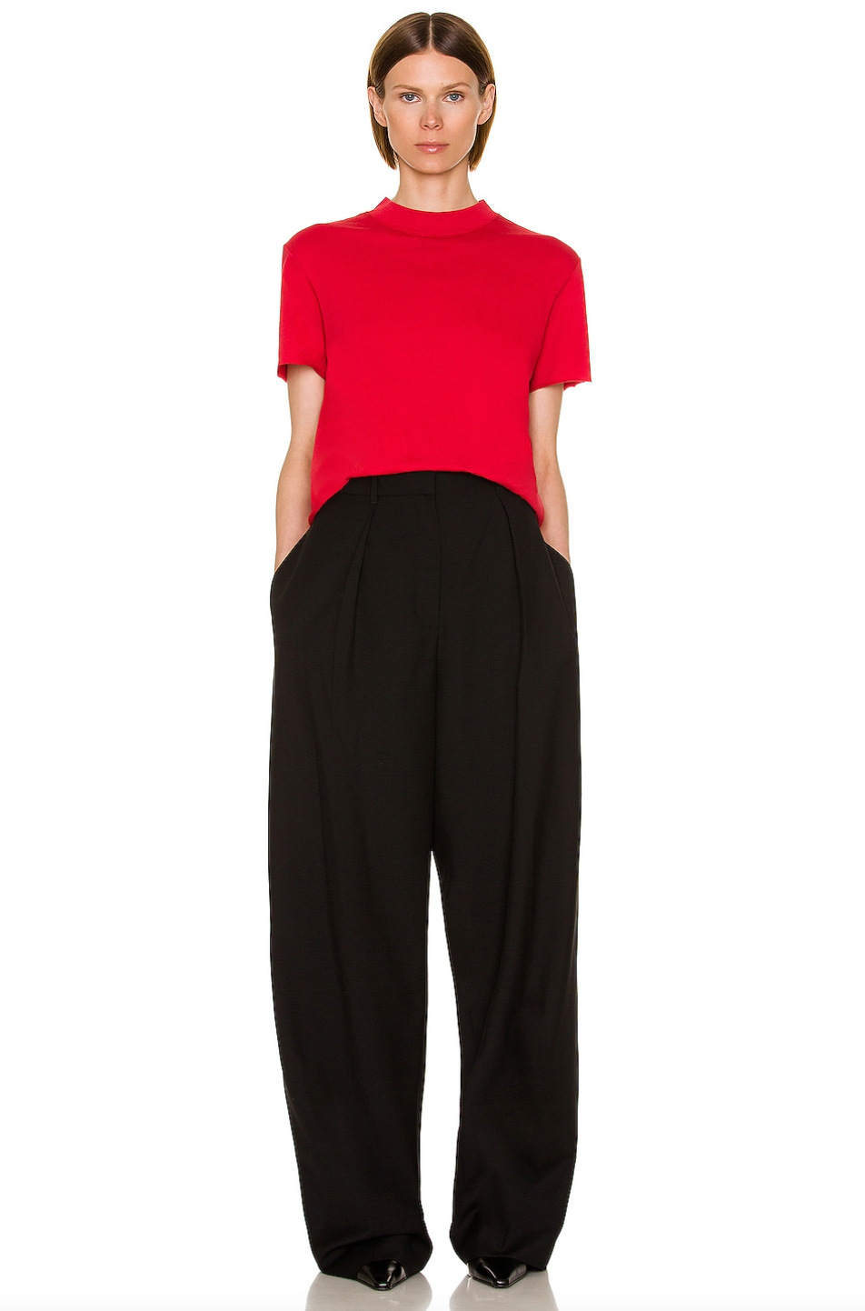 The Fedrino Top from The Row is crafted from soft slub jersey fabric, giving it a relaxed and slightly textured feel. Featuring raw cut sleeves and a raw hem, it adds an effortlessly cool, undone vibe to your casual look. Perfect for those who love playful, easygoing style with a twist.