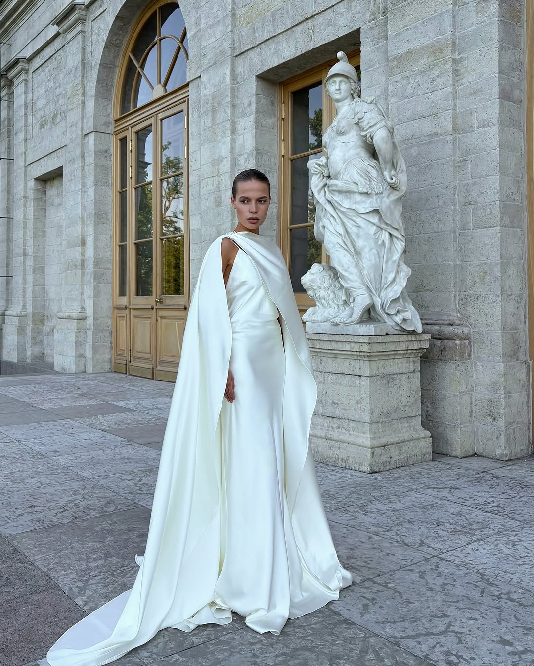 The Isobel Gown features a sleek cape with a smooth texture that radiates elegance and strength. Its flowing fabric and refined silhouette ensure a striking presence, while the carefully selected material resists wrinkles and maintains perfect form all evening. This gown completes any special occasion effortlessly, requiring no extra embellishments to leave a lasting impression.