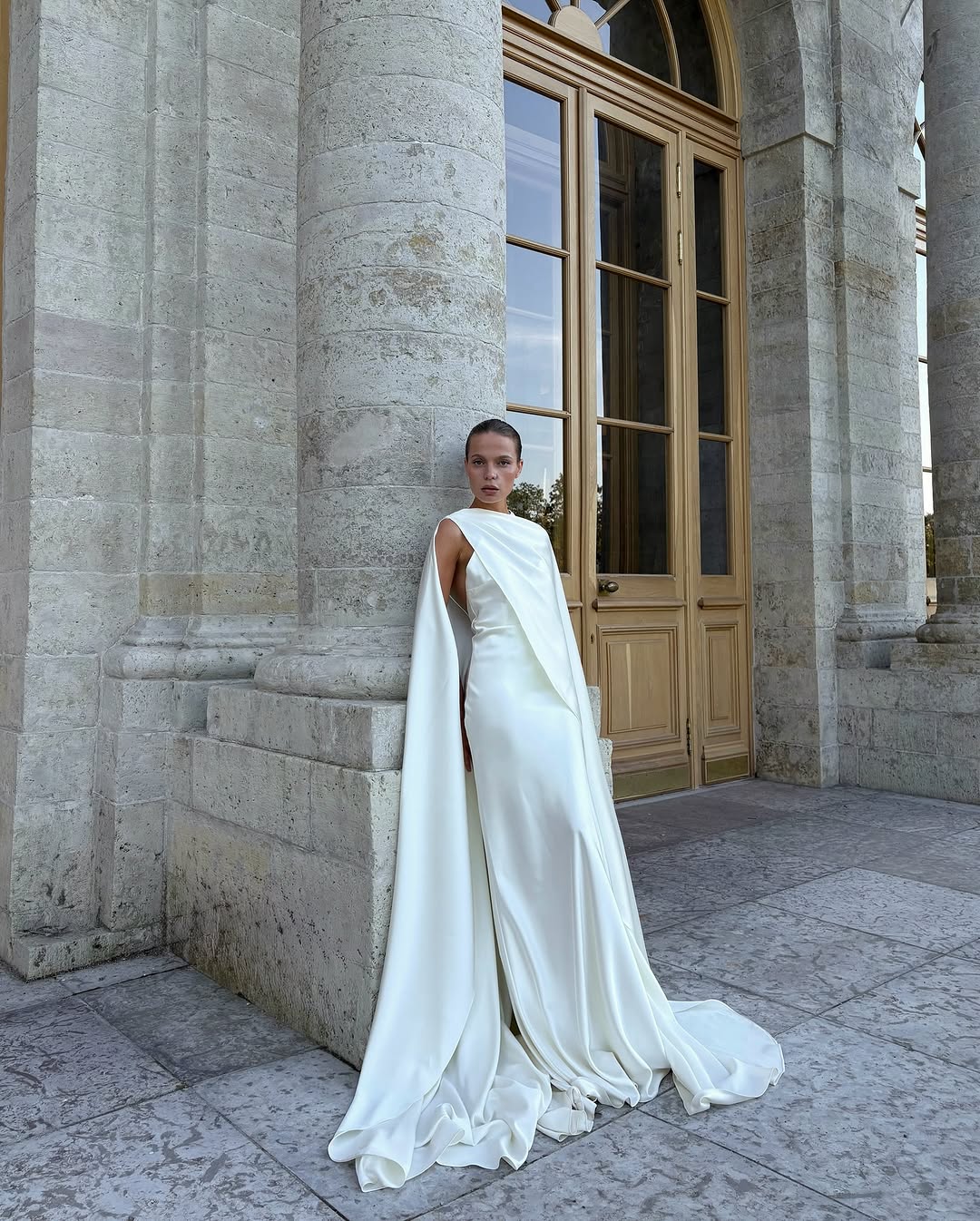 The Isobel Gown features a sleek cape with a smooth texture that radiates elegance and strength. Its flowing fabric and refined silhouette ensure a striking presence, while the carefully selected material resists wrinkles and maintains perfect form all evening. This gown completes any special occasion effortlessly, requiring no extra embellishments to leave a lasting impression.
