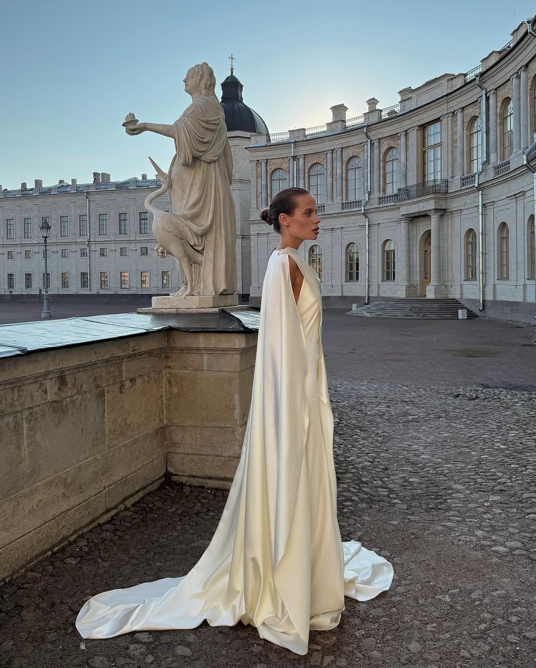 The Isobel Gown features a sleek cape with a smooth texture that radiates elegance and strength. Its flowing fabric and refined silhouette ensure a striking presence, while the carefully selected material resists wrinkles and maintains perfect form all evening. This gown completes any special occasion effortlessly, requiring no extra embellishments to leave a lasting impression.