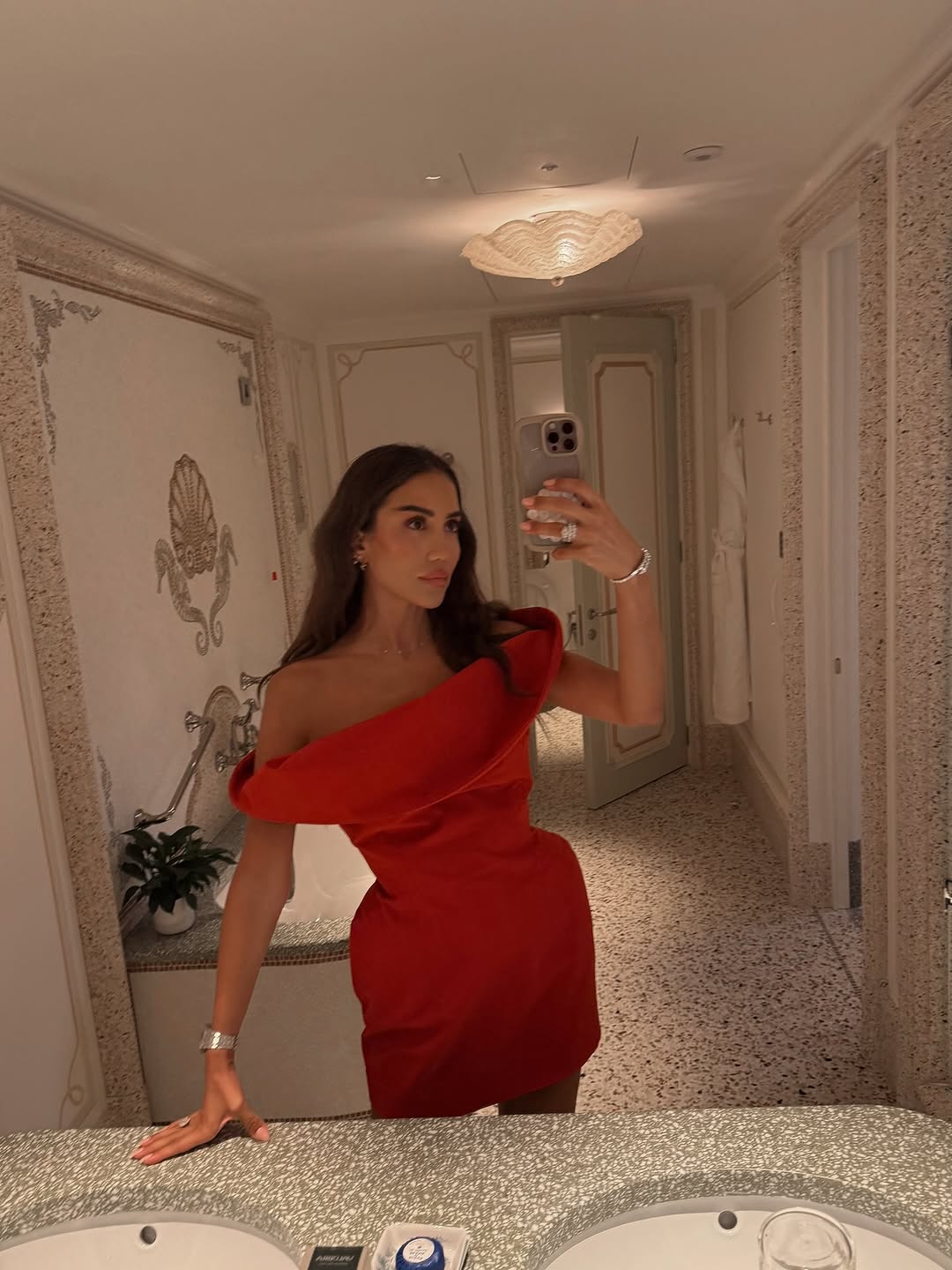 Experience bold sophistication with this minidress crafted from a lightweight cotton-blend fabric that ensures comfort and ease. Its sculptural silhouette enhances your natural shape while the asymmetrical neckline adds a modern edge. Exaggerated hips create a striking profile, making this piece perfect for those who want to stand out with confidence and style. Designed to empower, it blends artisanal craftsmanship with contemporary flair, redefining elegance for the fearless woman.