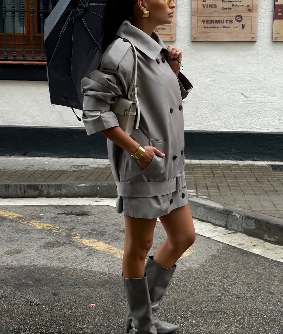 The Major Trench Jacket by Helsa blends classic style with practical features to elevate your wardrobe. Its front button closure and padded shoulders ensure both comfort and a sharp silhouette, while epaulettes and belted cuffs add refined detail. Made from durable gabardine fabric, this jacket offers versatility and long-lasting wear. Side seam pockets provide convenient storage, and the optional belt lets you customize your fit. Perfect for any season, it’s the ideal choice for a polished, confident look.