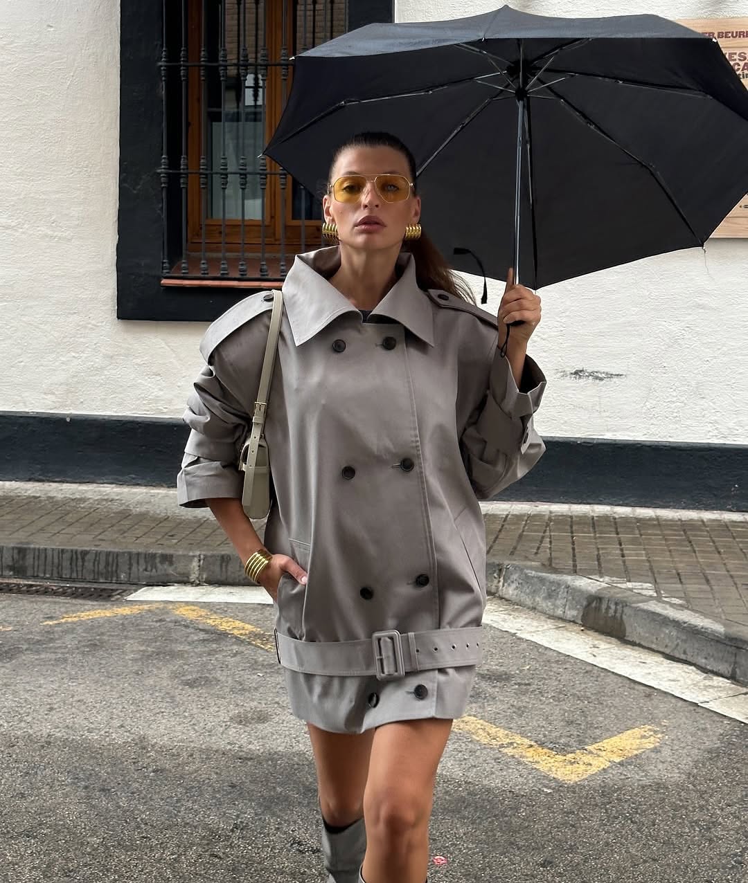 The Major Trench Jacket by Helsa blends classic style with practical features to elevate your wardrobe. Its front button closure and padded shoulders ensure both comfort and a sharp silhouette, while epaulettes and belted cuffs add refined detail. Made from durable gabardine fabric, this jacket offers versatility and long-lasting wear. Side seam pockets provide convenient storage, and the optional belt lets you customize your fit. Perfect for any season, it’s the ideal choice for a polished, confident look.