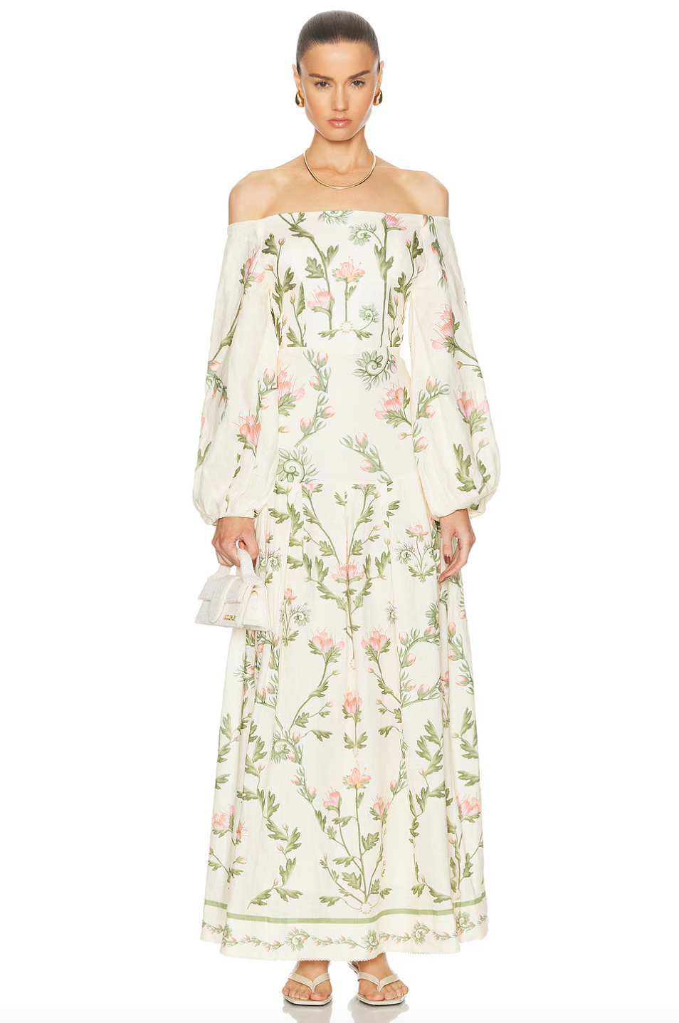 Integrate luxury into your wardrobe with the Senlis Oasis dress from Agua by Agua Bendita. This floral linen dress boasts billowy puff sleeves and intricate florals for an elegant, bohemian style. Stand out in a sea of fashion with this must-have drop-waist dress.