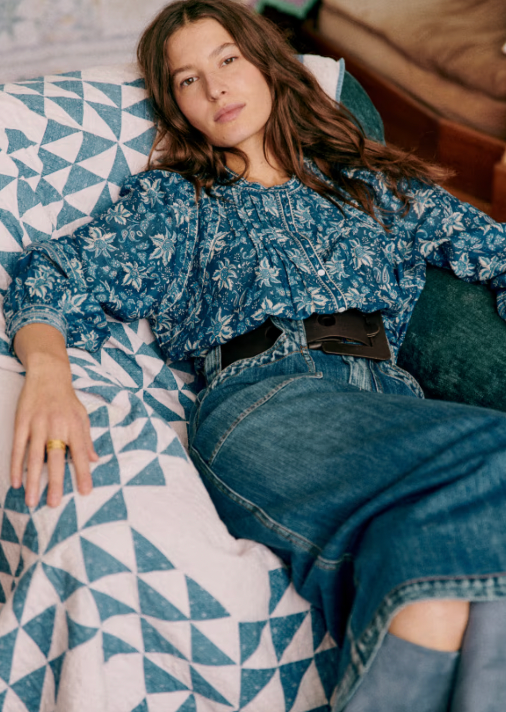 The Mariana Shirt by Sezane combines classic sophistication with modern style. Featuring an officer collar and button-down front, this long sleeve shirt offers a polished look perfect for any occasion. Its wide sleeves are elegantly gathered at the shoulders and cuffs, creating a graceful silhouette that cinches at the wrist for a tailored finish. Elevate your wardrobe with this statement piece that balances comfort and chic design effortlessly.