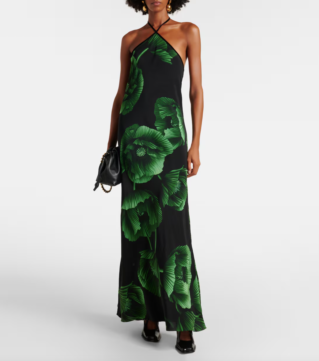 Experience elegance with the Floral Embroidered Silk Gown in green by Johanna Ortiz. Crafted from fluid silk, this floor-grazing gown showcases delicate floral embroidery and is enhanced by a dramatic draped cape detail. Perfect for making a graceful statement, it combines luxurious comfort with timeless sophistication.