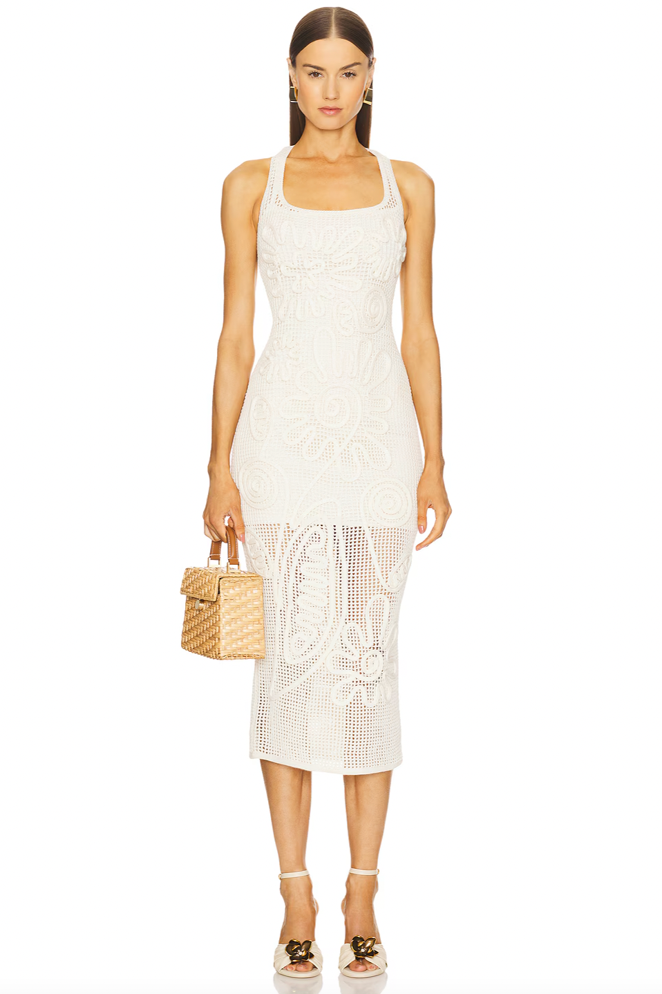 The Nissa Knit Dress by Cult Gaia features a mid-weight crochet knit fabric with a partially lined design, offering a delicate, semi-sheer look that highlights your style. Its easy pull-on styling ensures effortless wear, while the breathable texture provides comfort throughout the day. Perfect for showcasing chic layering, this dress pairs beautifully with your favorite undergarments to create a sophisticated and alluring outfit. Hand wash recommended to maintain its quality and shape.