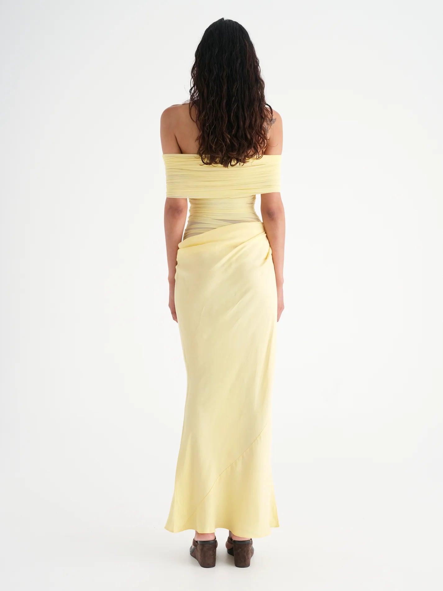 Introducing Nico, the sophisticated version of our Yasmin Maxi Dress. The off-shoulder design and cowl on the left side waist creates a flattering silhouette, while the overlapping skirt and mesh bodice add depth. Enhance your feminine charm with the option to show off some skin on the left hand side waist.