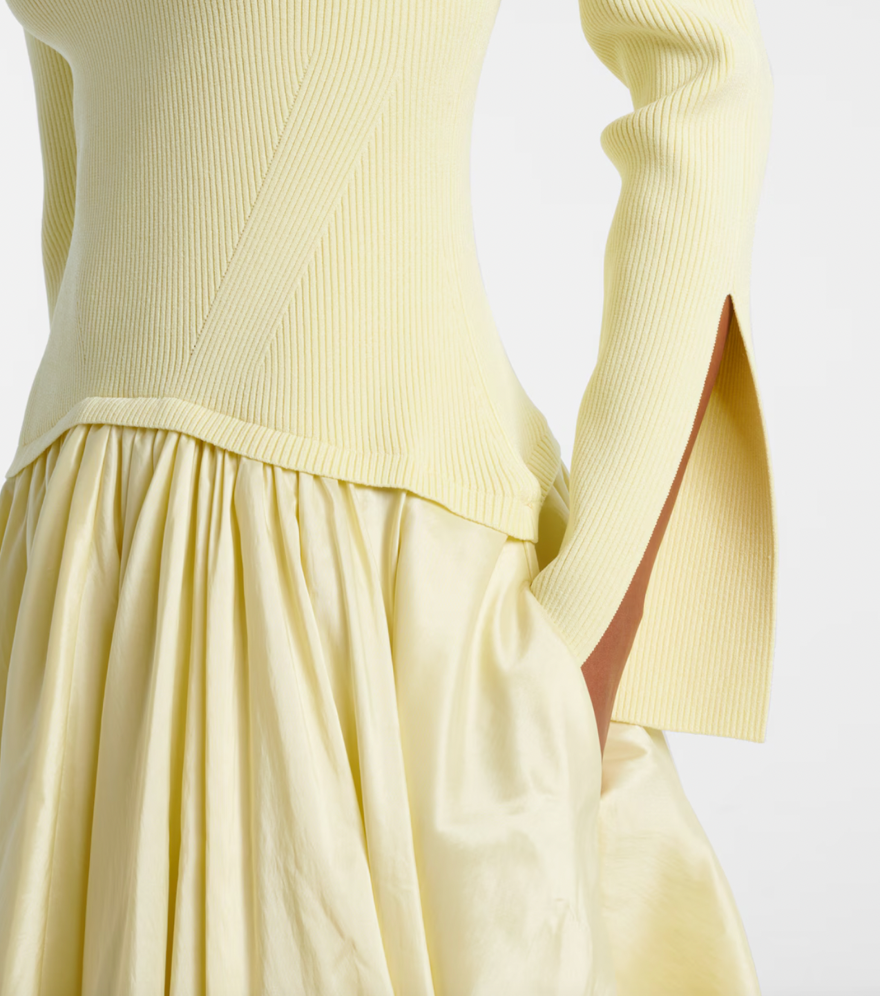 The Izzy Taffeta Midi Dress from Simkhai offers a striking blend of textures, featuring a ribbed-knit bodice that flatters your shape and a voluminous taffeta skirt that commands attention. This unique silhouette ensures you stand out effortlessly at any event, combining comfort with bold elegance for a memorable style statement.