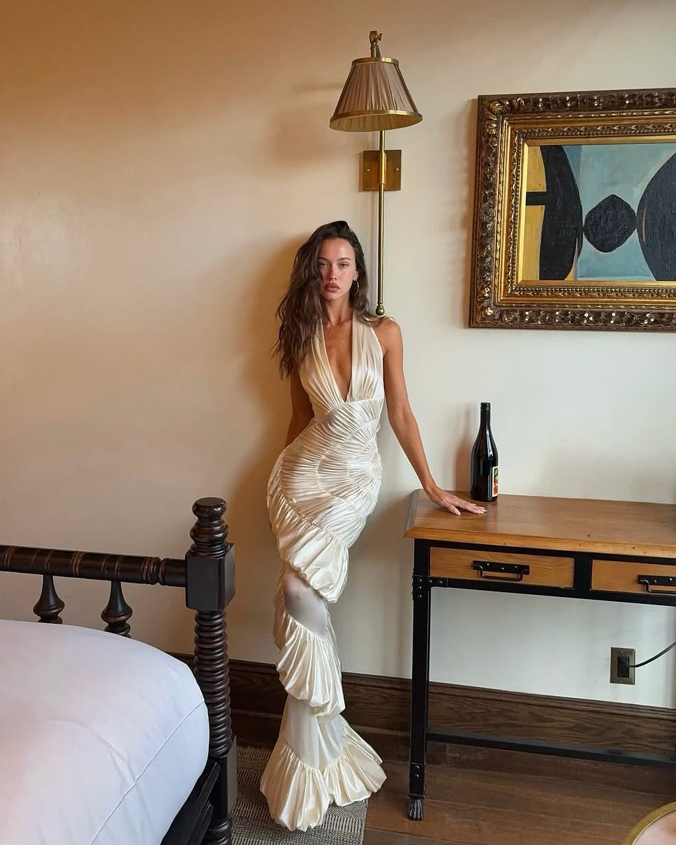 The Ammonite Gown by Datt merges sophisticated style with everyday wearability. Its luxurious soft mesh fabric creates a graceful silhouette that moves with you, while the strategic side zip eliminates the struggle of getting dressed. Paired with a dedicated bikini lining, this gown delivers the confidence of complete coverage beneath an undeniably elegant exterior. Perfect for those moments when you refuse to compromise between comfort and looking absolutely stunning.