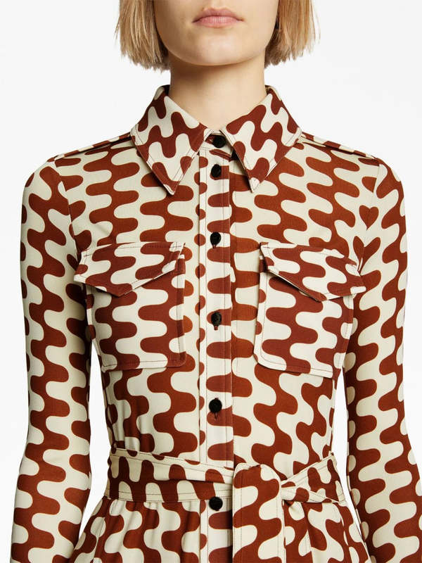 Proenza Schouler's Printed Matte Jersey Shirt Dress is cut to a slim-fitting silhouette and patterned with a retro zigzag motif in wine red and ecru. Finished with a self-tie waist belt and polished gold-tone metal cufflinks.
