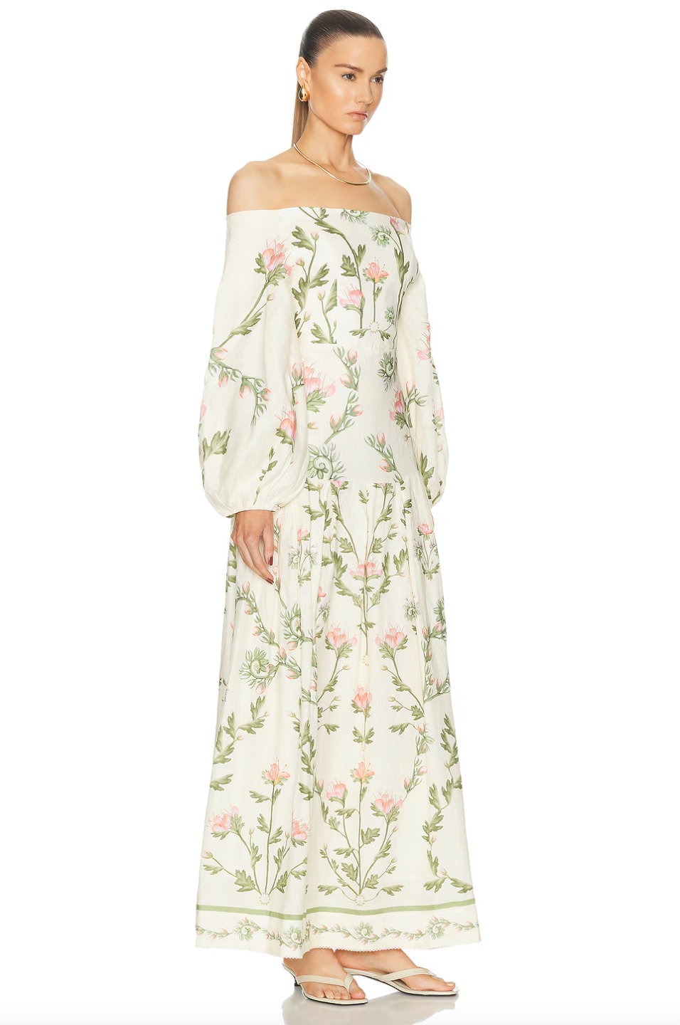 Integrate luxury into your wardrobe with the Senlis Oasis dress from Agua by Agua Bendita. This floral linen dress boasts billowy puff sleeves and intricate florals for an elegant, bohemian style. Stand out in a sea of fashion with this must-have drop-waist dress.