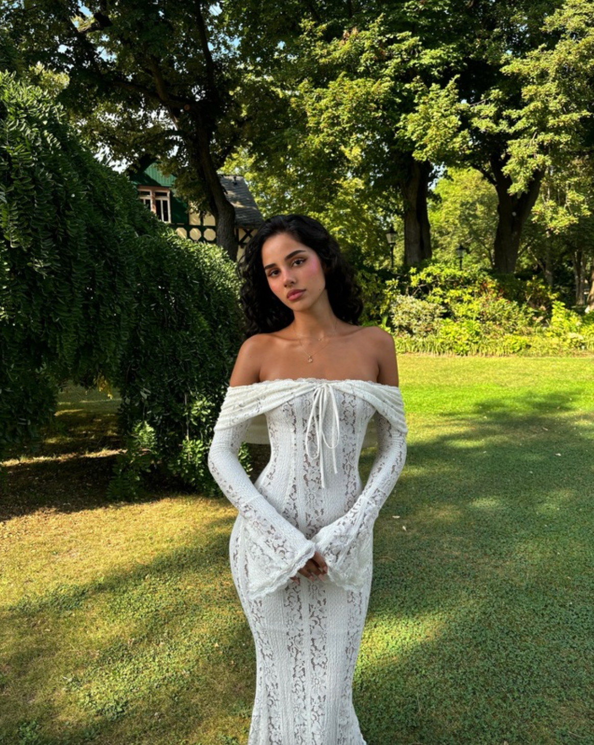 Indulge in luxury with the Belle Maxi Dress. This elegant piece features a vintage cream floral lace design, showcasing a delicate and sophisticated off shoulder style. Perfect for making a statement at any event, this maxi dress radiates beauty and exclusivity. Elevate your wardrobe with this timeless and refined piece.