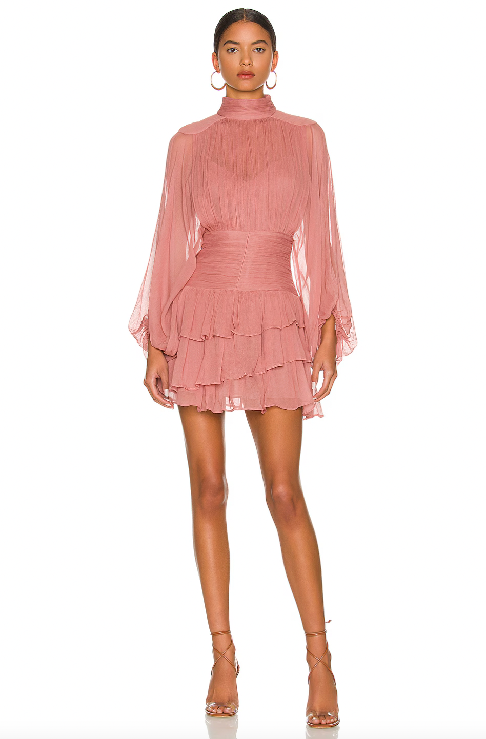 Elevate your style with the Olympia mini dress by Shona Joy. The turtleneck and tiered ruffle skirt bring a touch of sophistication, while the hidden back zipper and keyhole add subtle details. The ruched waist and attached slip lining provide comfort and a flattering fit. A must-have for any fashion-forward wardrobe!