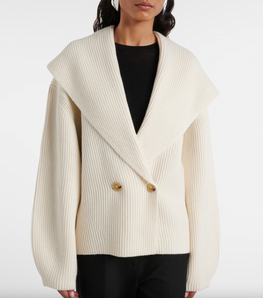 Elevate your wardrobe with this shawl-lapels cardigan from Toteme, a brand renowned for its modern, refined approach to dressing. Designed with a slightly oversized fit and rounded sleeves, it adds sophisticated volume and effortless layering to any outfit. Crafted for comfort and style, this sculptural piece is perfect for defining your personal dress code while staying cozy and polished.