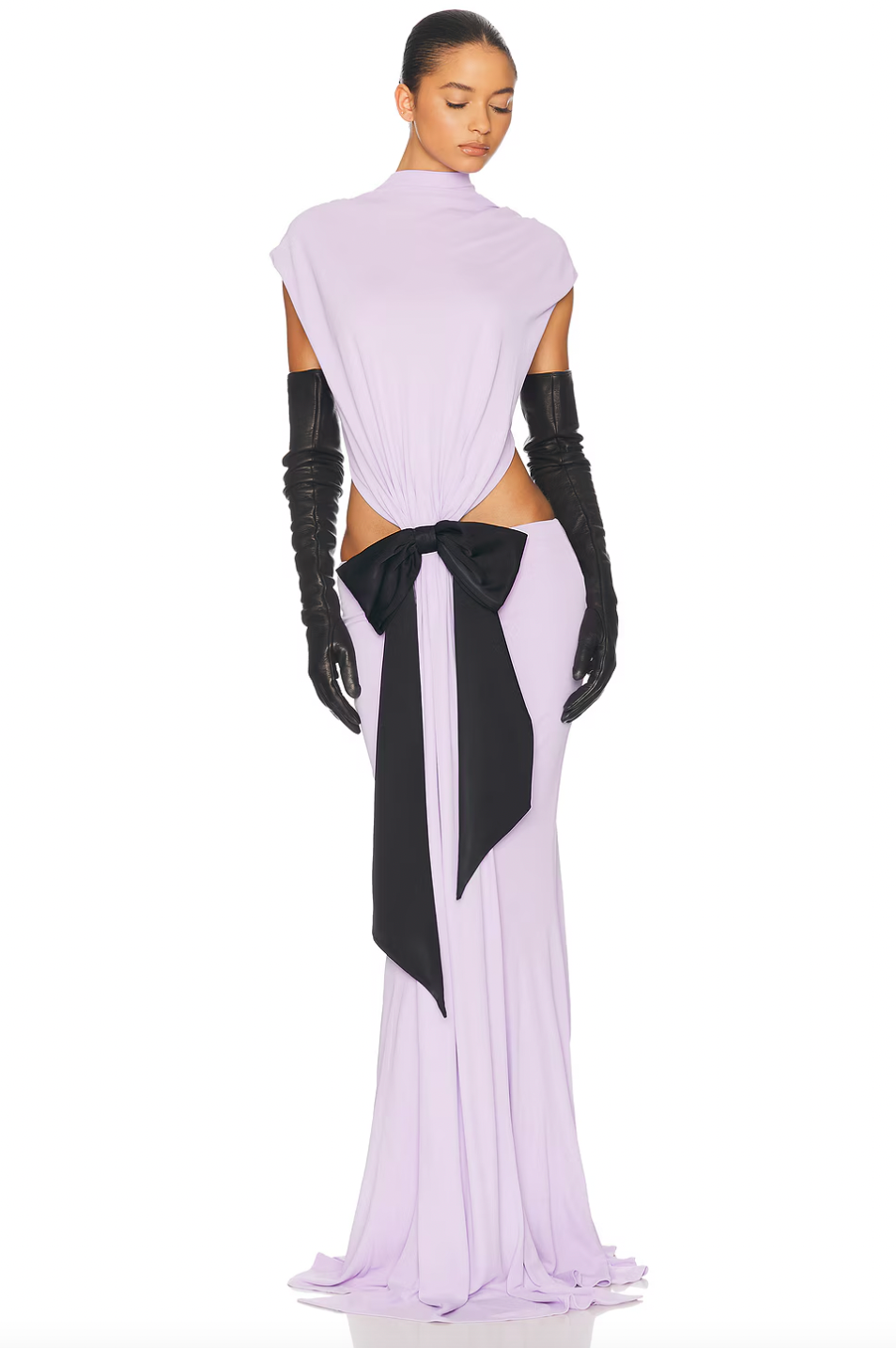 Elevate your wardrobe with The Constantina Jersey Dress With Bow, designed for effortless elegance. Made from soft jersey fabric, it features a flattering pull-on style with unique cut-out details at the back and waist for a modern touch. Partially lined for comfort, the dress is finished with a delicate satin bow that adds a hint of sophistication. Ideal for special occasions, this dress combines style and comfort perfectly, making it a versatile addition to your collection. 