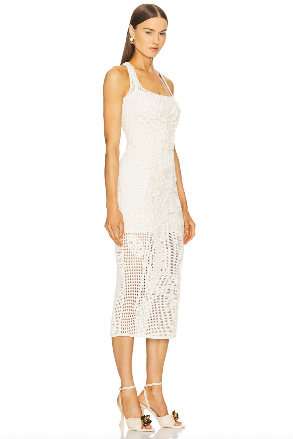 The Nissa Knit Dress by Cult Gaia features a mid-weight crochet knit fabric with a partially lined design, offering a delicate, semi-sheer look that highlights your style. Its easy pull-on styling ensures effortless wear, while the breathable texture provides comfort throughout the day. Perfect for showcasing chic layering, this dress pairs beautifully with your favorite undergarments to create a sophisticated and alluring outfit. Hand wash recommended to maintain its quality and shape.