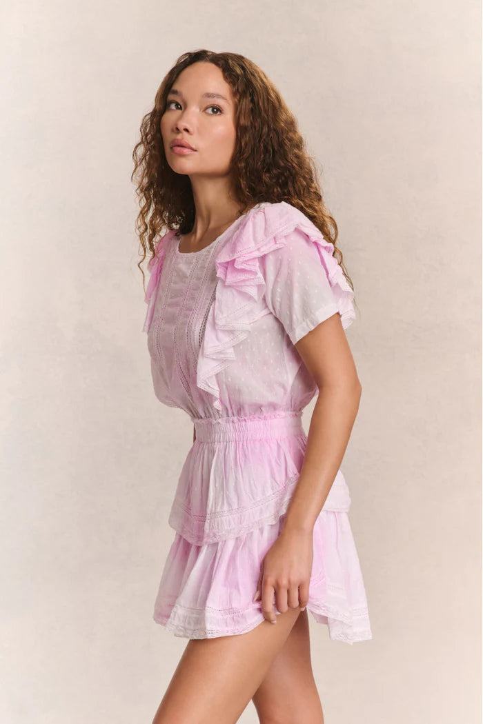 Elevate your style with the Natasha Heritage Mini Dress! The double ruffled flutter sleeves effortlessly accentuate the elasticated waist, while delicate lace trims add a touch of femininity. Perfect for any occasion, this dress exudes elegance and ease.