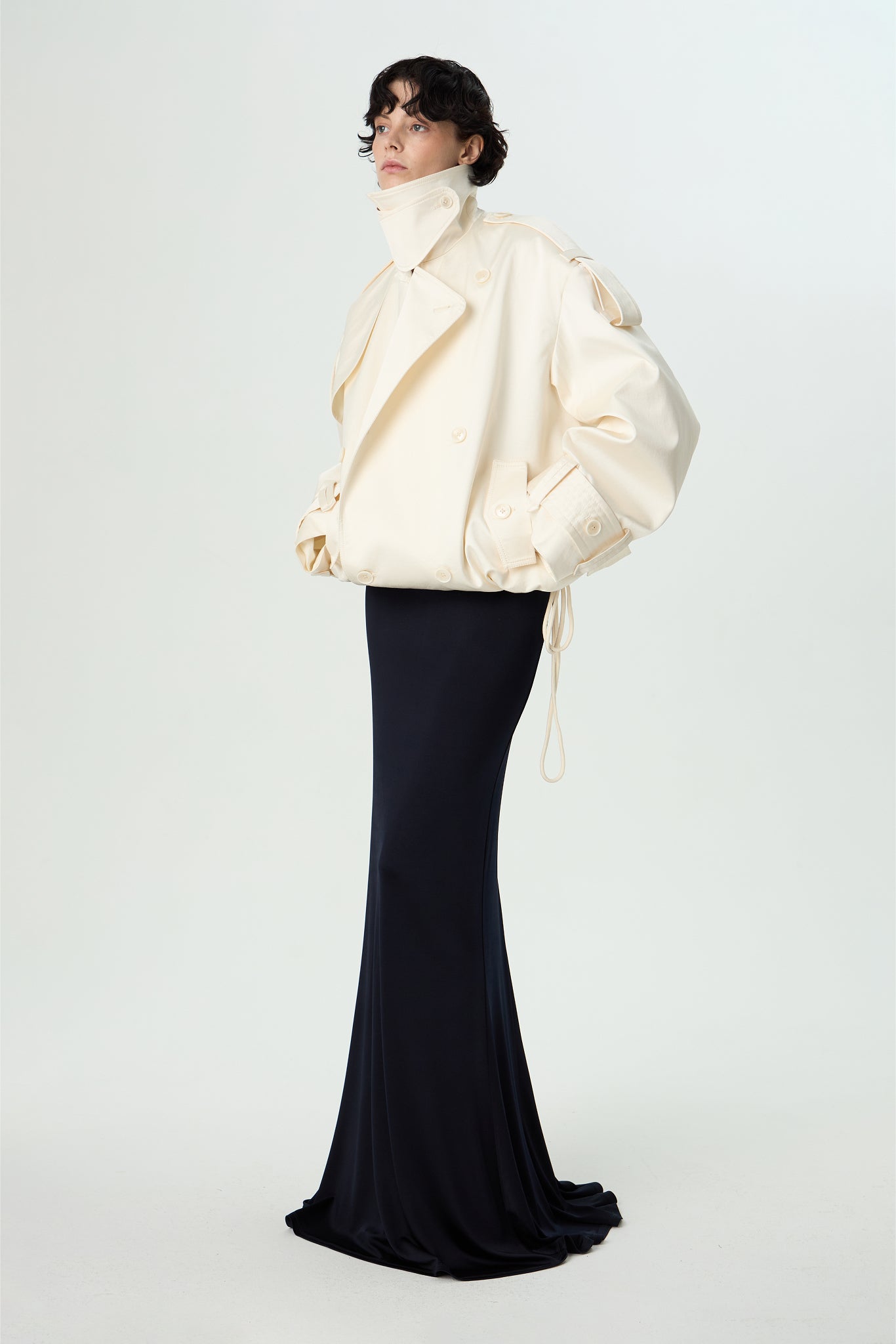 The Pentimento Trench Coat offers a timeless design that embraces change and evolution, much like the artistic concept it’s named after. Crafted with thoughtful details that adapt to your style, this coat transforms your look effortlessly while providing comfort and sophistication. Make a statement by wearing a piece that celebrates thoughtful reinvention and enduring elegance.