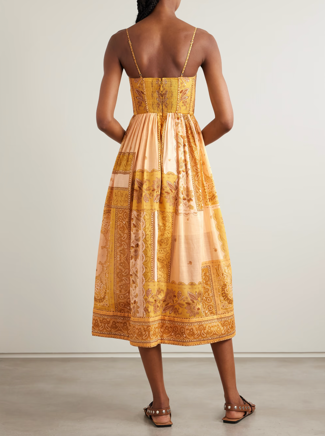 Embrace effortless elegance with this charming midi dress, featuring a vibrant bandana print on breathable cotton-voile fabric. The relaxed silhouette flatters every figure while the midi length offers versatile styling for day-to-night occasions. Perfect for warm weather adventures, casual gatherings, or weekend getaways, this piece brings playful sophistication to your wardrobe. The lightweight cotton-voile keeps you cool and comfortable, while the timeless bandana pattern adds personality and movement. 