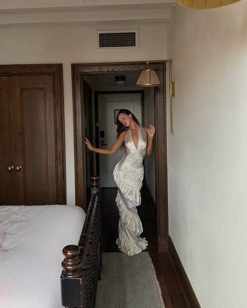 The Ammonite Gown by Datt merges sophisticated style with everyday wearability. Its luxurious soft mesh fabric creates a graceful silhouette that moves with you, while the strategic side zip eliminates the struggle of getting dressed. Paired with a dedicated bikini lining, this gown delivers the confidence of complete coverage beneath an undeniably elegant exterior. Perfect for those moments when you refuse to compromise between comfort and looking absolutely stunning.