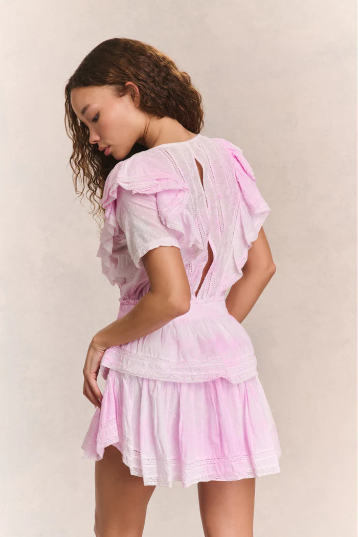 Elevate your style with the Natasha Heritage Mini Dress! The double ruffled flutter sleeves effortlessly accentuate the elasticated waist, while delicate lace trims add a touch of femininity. Perfect for any occasion, this dress exudes elegance and ease.