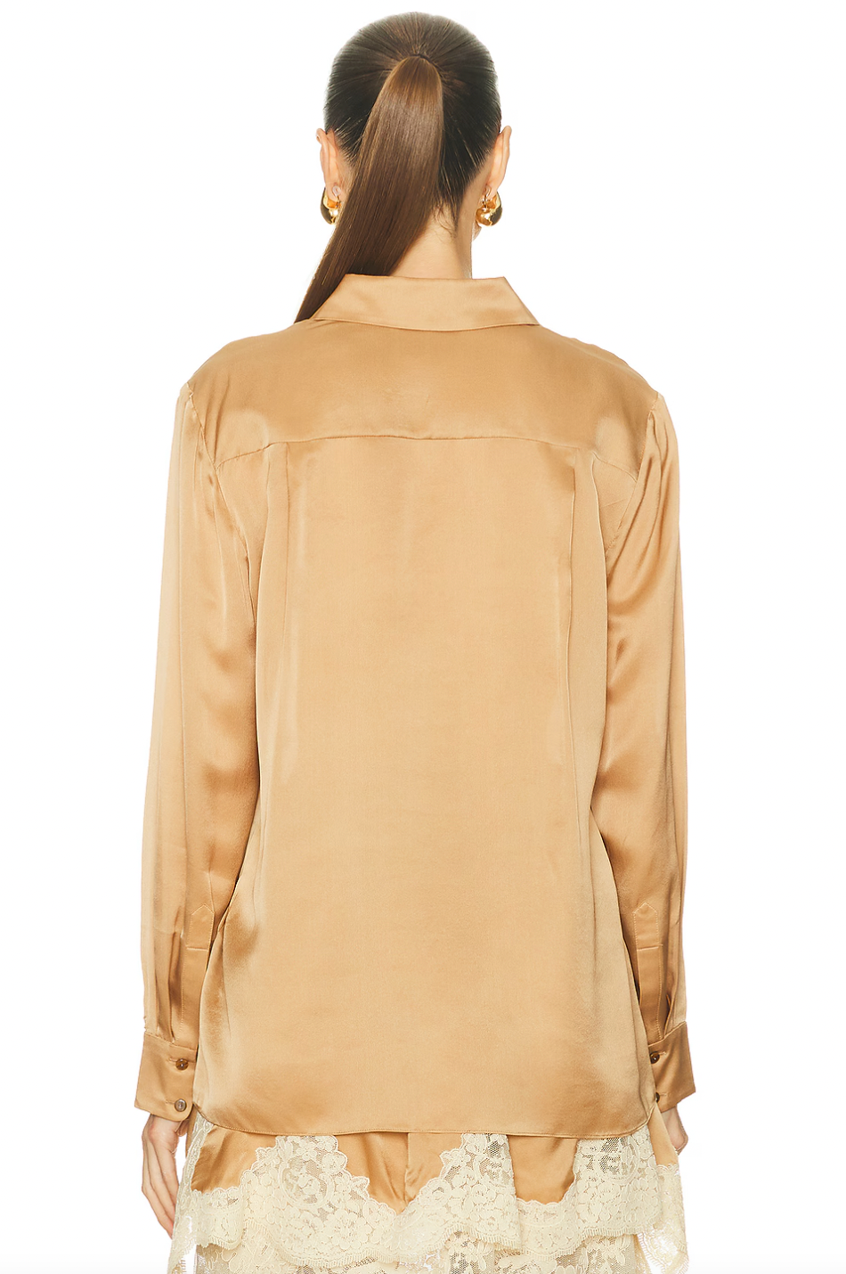 The Hypnotic Satin Shirt by Zimmermann blends effortless elegance with subtle details. Its lightweight satin fabric offers a smooth, breathable feel, perfect for all-day comfort. Featuring a front button closure and button cuffs, this shirt delivers a refined fit. The delicate embroidered logo on the front adds a touch of sophistication, making it an ideal choice for both casual and polished looks. Elevate your wardrobe with this versatile, stylish piece.