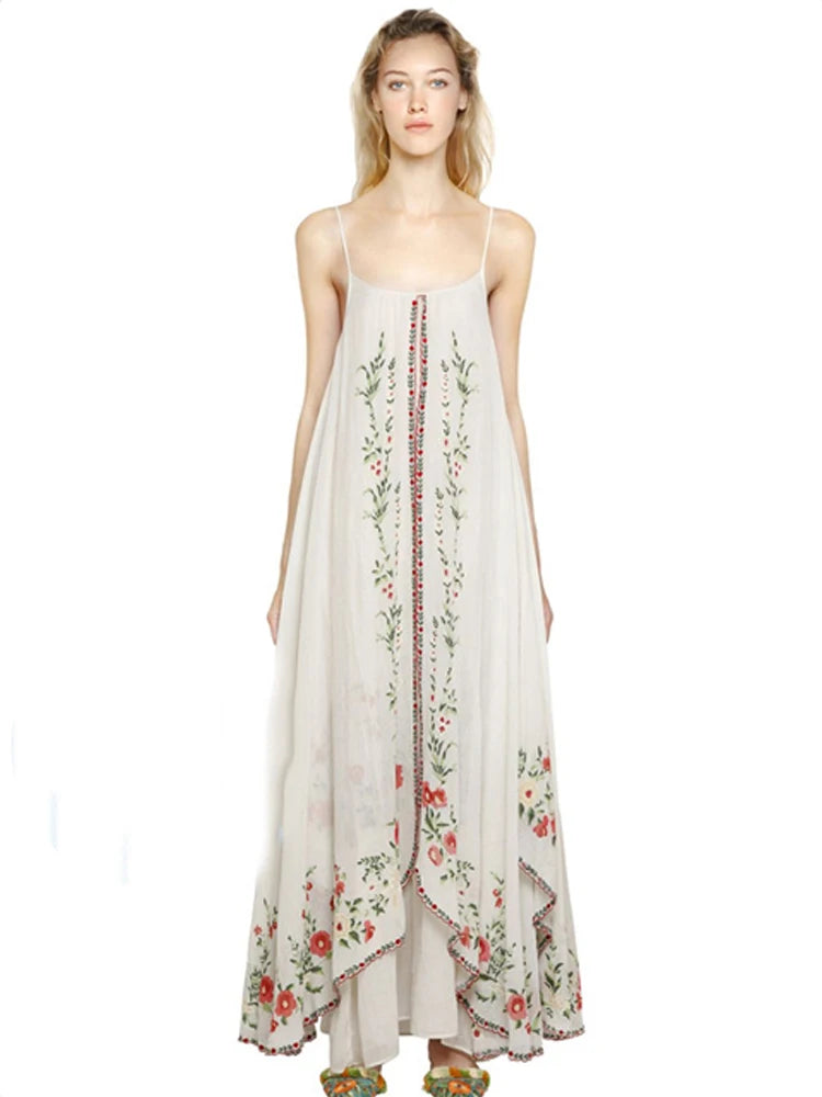 Introducing the Dress Josephine, the perfect summer dress with retro national wind design and delicate flower embroidery. Travel in style with this bohemian beach dress that comes with a halter belt for a flawless fit. Embrace the comfort and elegance of this must-have addition to your wardrobe.