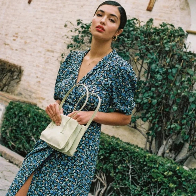 Introducing Dress Elise - the perfect addition to your spring and summer wardrobe. This new ladies dress features a flattering V-neck and a beautiful printed design. Its mid-length cut is perfect for any occasion. Look stylish and feel confident in Dress Elise.