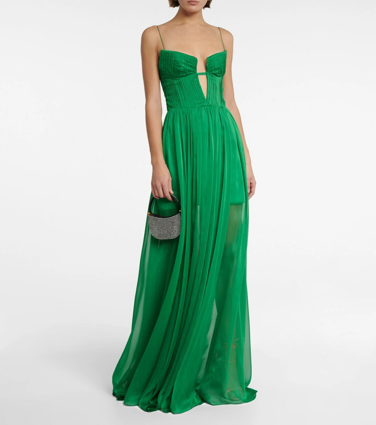 Indulge in ethereal elegance with the Cutout Chiffon Gown from Rasario. Crafted from airy chiffon with molded cups and a cutout bodice, this gown exudes sensuality. The transparent pleated skirt adds a touch of grace, making you the belle of the ball.