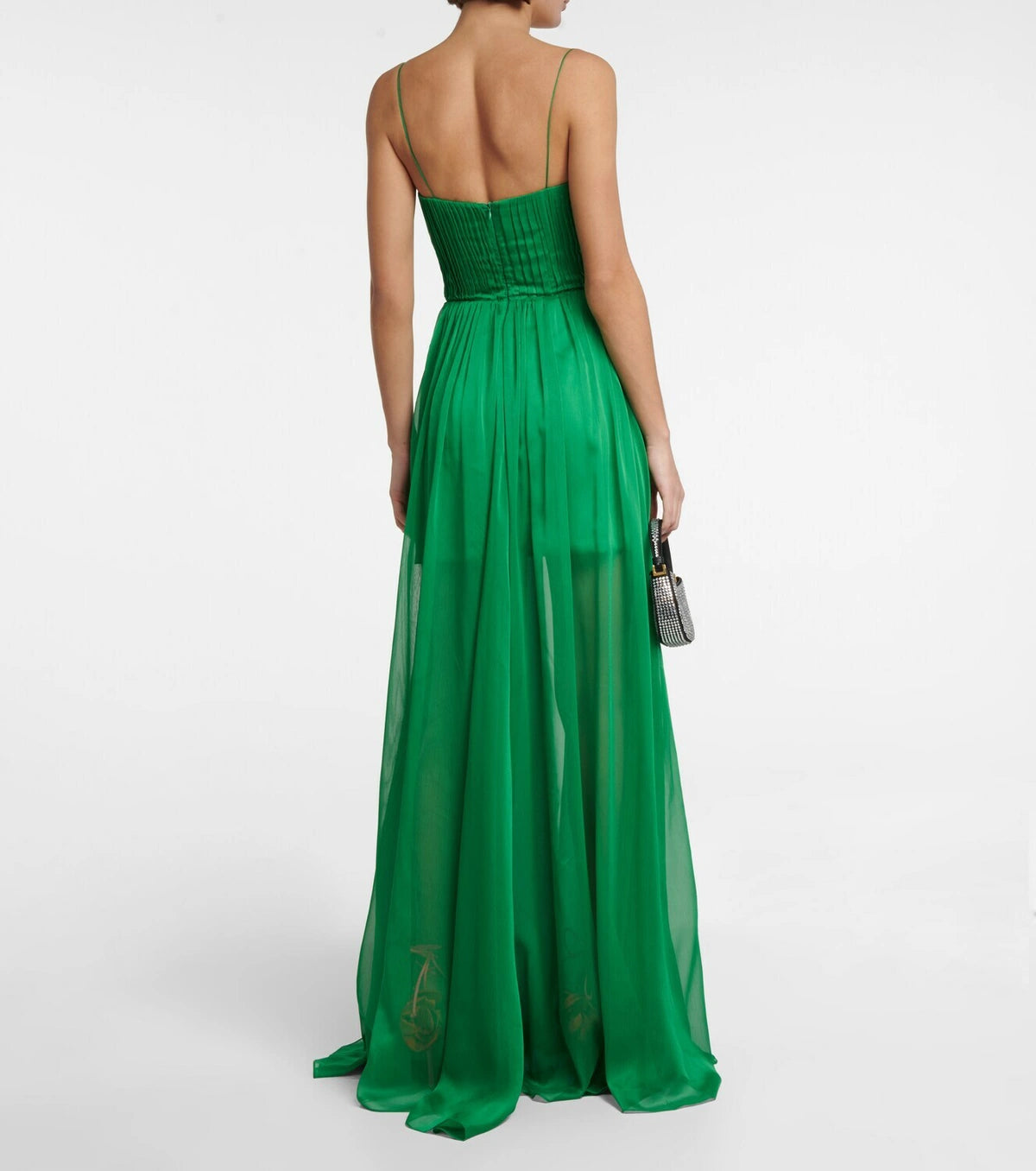 Indulge in ethereal elegance with the Cutout Chiffon Gown from Rasario. Crafted from airy chiffon with molded cups and a cutout bodice, this gown exudes sensuality. The transparent pleated skirt adds a touch of grace, making you the belle of the ball.