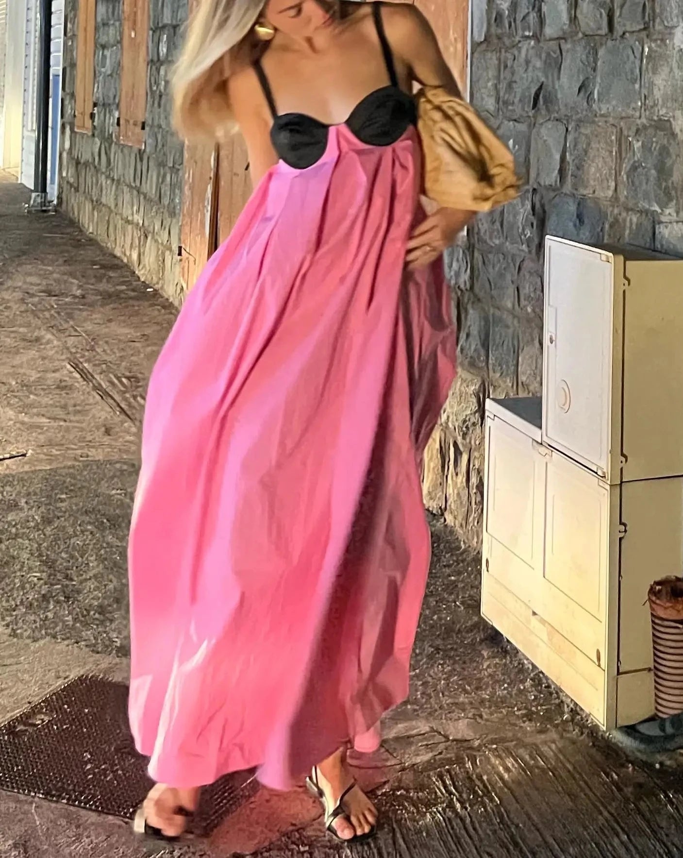 The Brisa Maxi Dress is an elegant and versatile addition to any wardrobe. With its backless design, lace-up detail, and spaghetti straps, this dress is both stylish and comfortable. Perfect for any occasion, from a night out to a formal event, the Brisa Maxi Dress is the ideal choice.