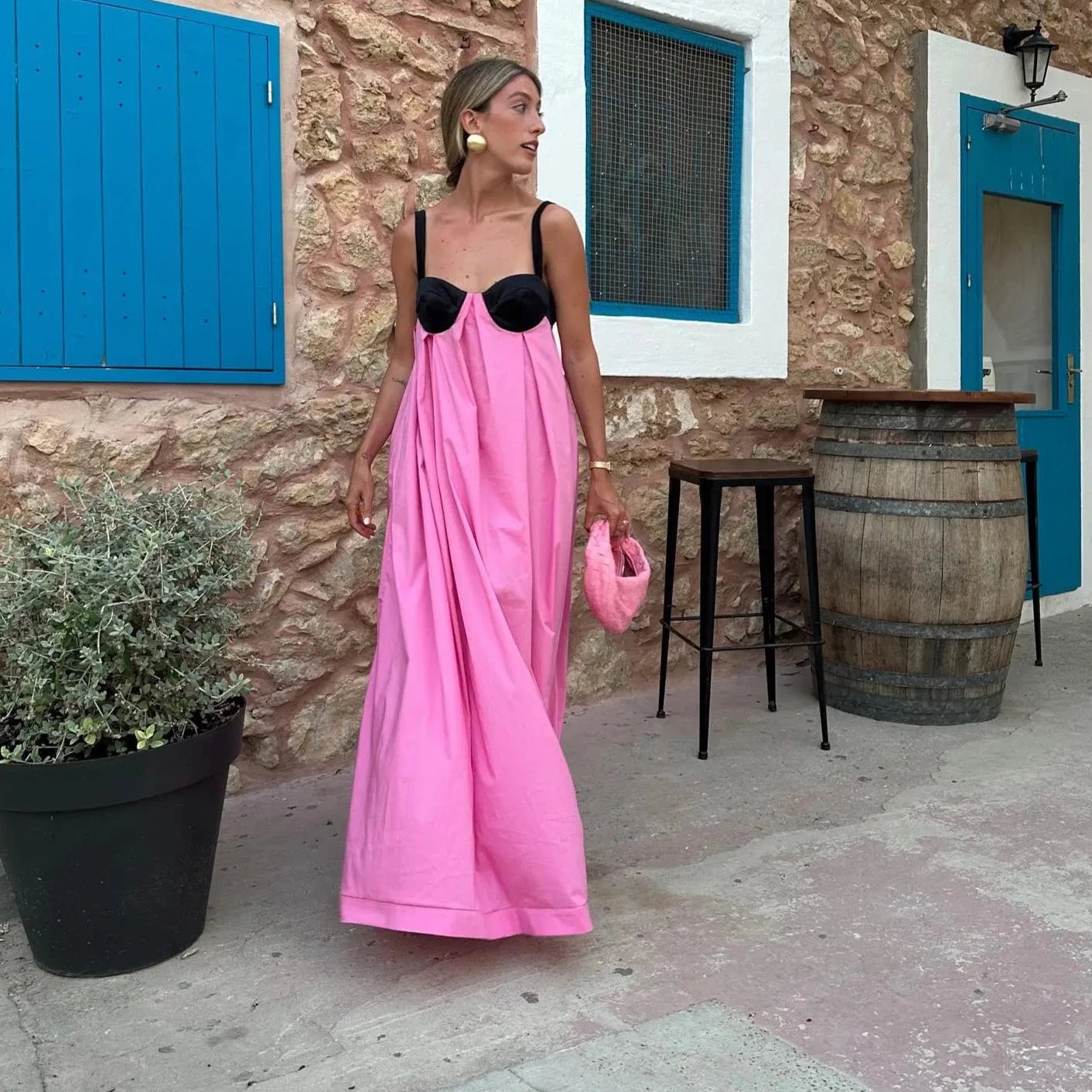 The Brisa Maxi Dress is an elegant and versatile addition to any wardrobe. With its backless design, lace-up detail, and spaghetti straps, this dress is both stylish and comfortable. Perfect for any occasion, from a night out to a formal event, the Brisa Maxi Dress is the ideal choice.