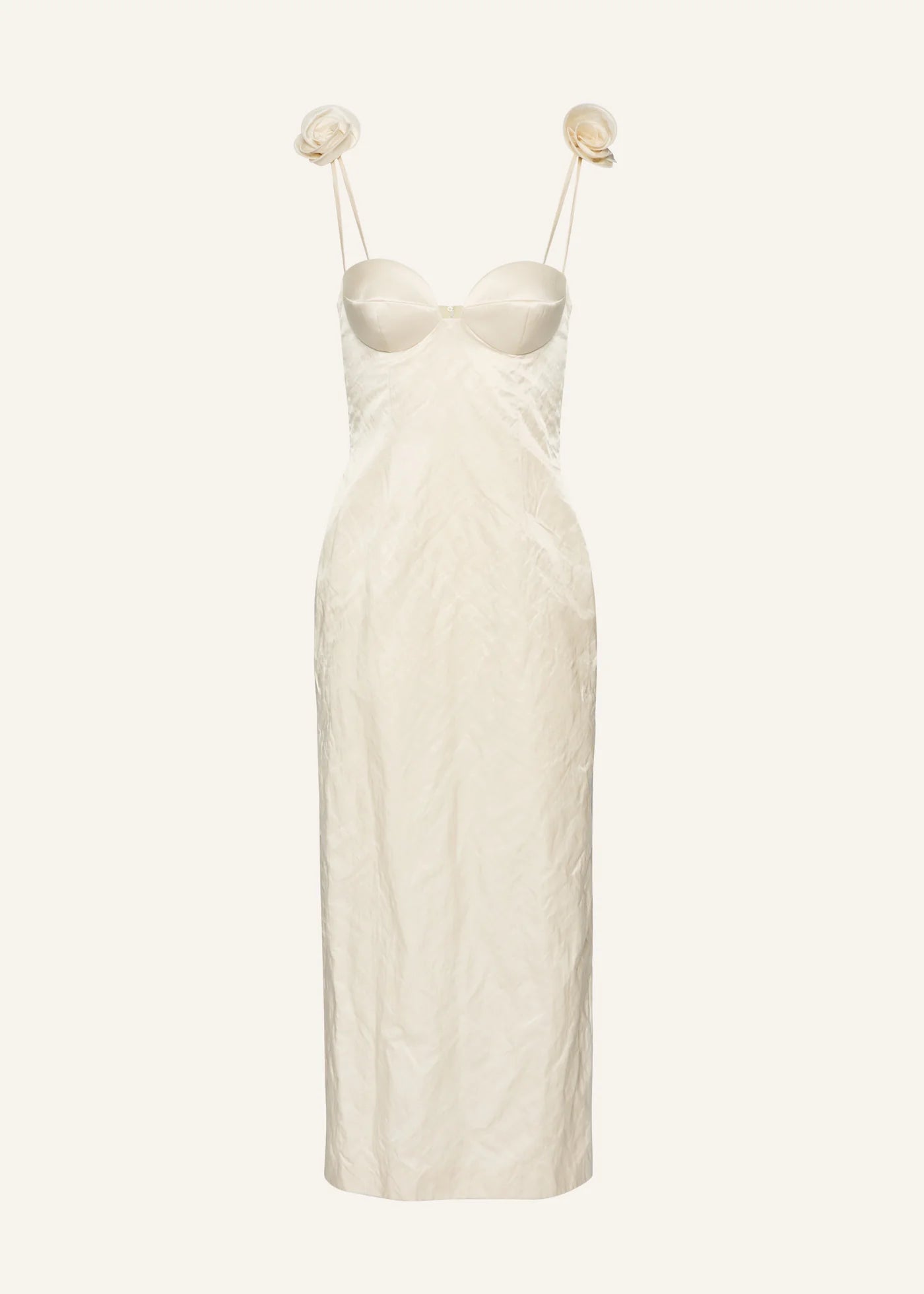 This Rosette bustier midi dress in cream redefines elegance with its iconic shape crafted from luxurious Japanese cotton crinkle fabric. The delicate 3D rosettes on the shoulder straps add a refined, romantic touch, making it perfect for standout occasions. Its flattering bustier silhouette enhances your figure while the breathable fabric ensures comfort throughout the day or night. Elevate your wardrobe with this timeless piece that blends classic design with contemporary details.