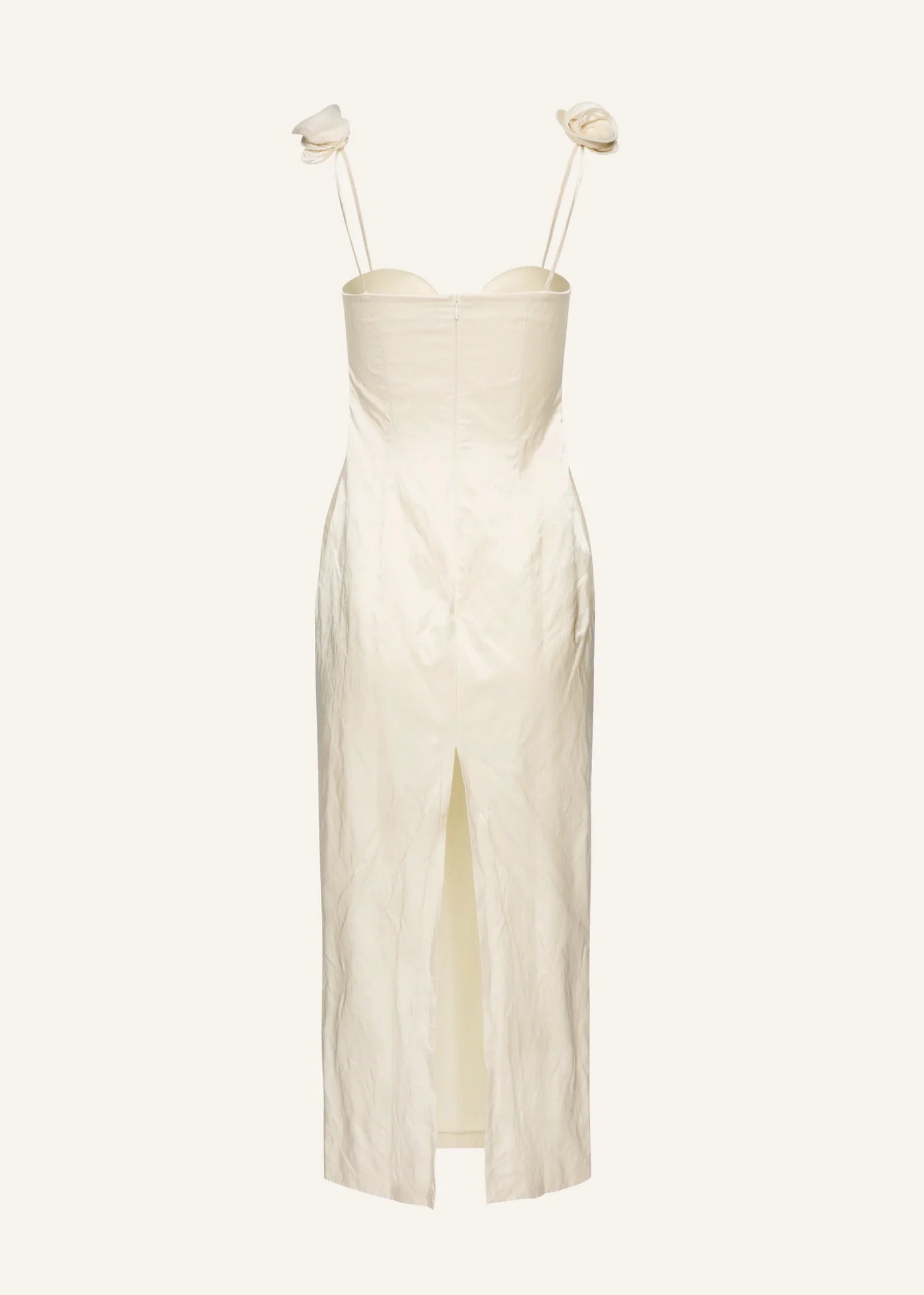 This Rosette bustier midi dress in cream redefines elegance with its iconic shape crafted from luxurious Japanese cotton crinkle fabric. The delicate 3D rosettes on the shoulder straps add a refined, romantic touch, making it perfect for standout occasions. Its flattering bustier silhouette enhances your figure while the breathable fabric ensures comfort throughout the day or night. Elevate your wardrobe with this timeless piece that blends classic design with contemporary details.