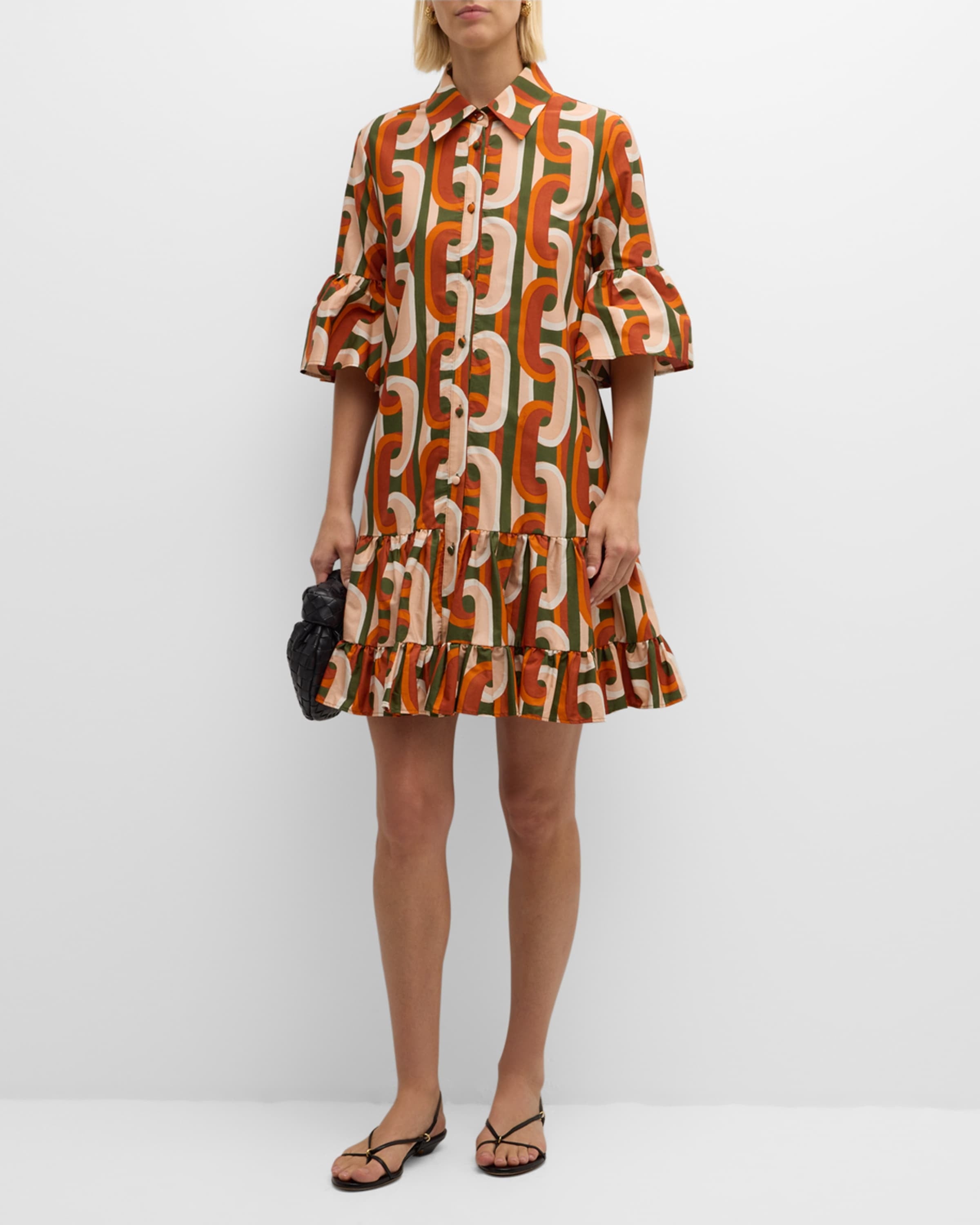 Elevate your everyday wardrobe with the DoubleJ Choux shirtdress, a sophisticated Italian-crafted piece that effortlessly transitions from day to night. This cotton mini dress features an eye-catching chain-link print and charming tiered ruffle hem that adds movement and dimension. The classic point collar and button-front design offer timeless appeal, while practical side split pockets keep essentials within reach. 