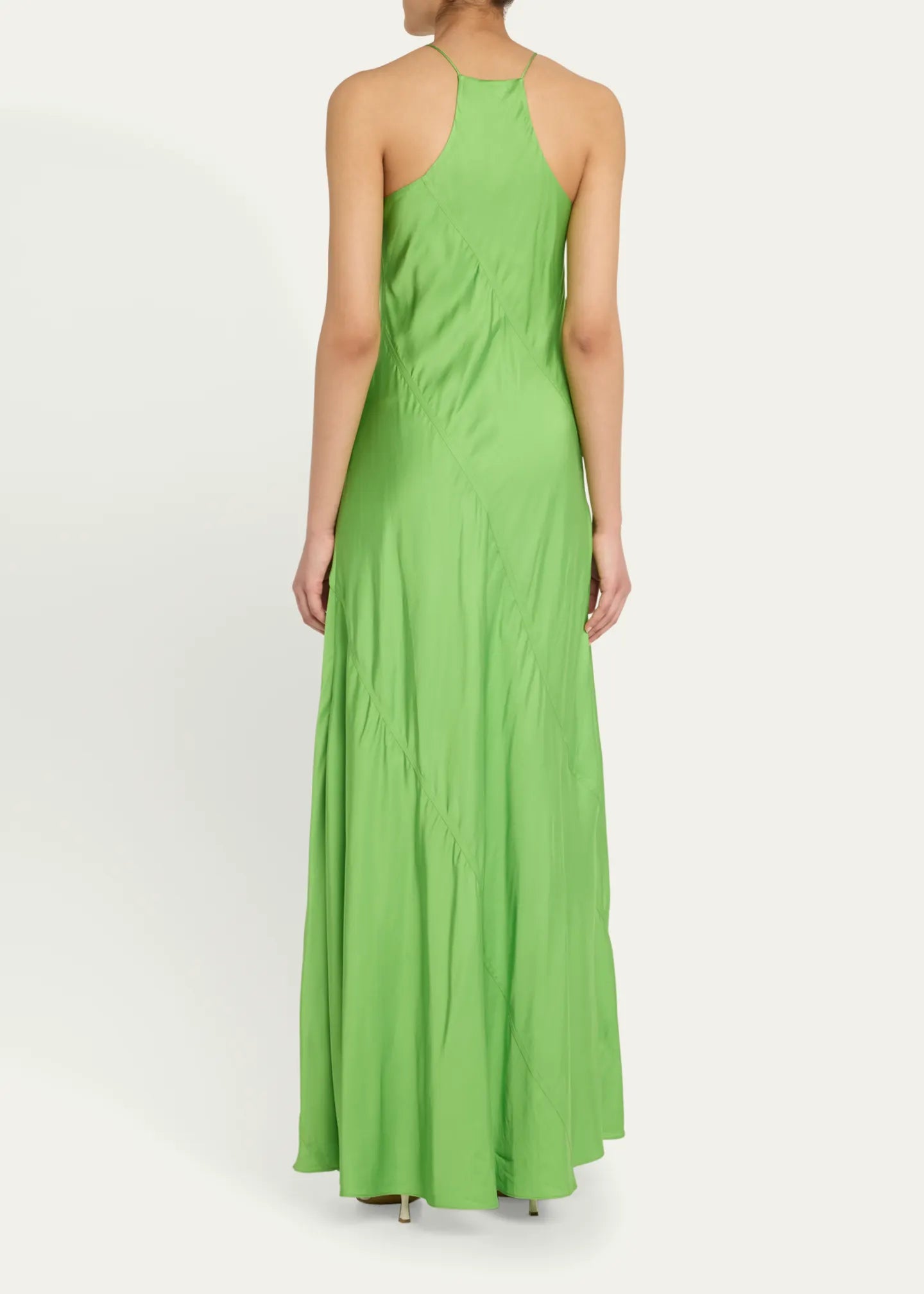 Elevate your elegance with the Sybil Satin Dress by A.L.C. This full-length, paneled satin gown features a sleek slip silhouette and a sophisticated high neckline that flatters every figure. Its sleeveless racerback design offers modern allure, while the side zip ensures a seamless fit. Crafted from luxurious viscose, this unlined dress promises comfort and style for unforgettable occasions. Make a striking statement with timeless grace.