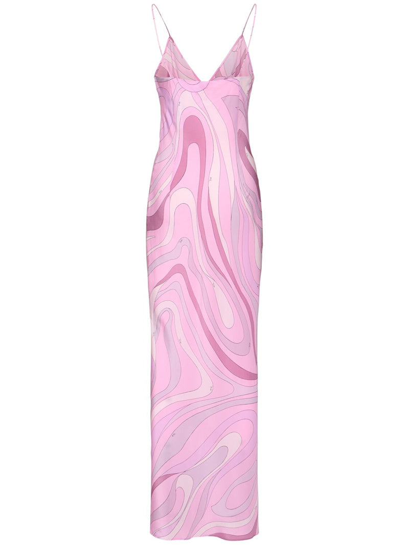 Elevate your special moments with the Marmo Silk Dress by Pucci. Made from luxurious crêpe de chine silk, this dress combines a smooth, lightweight feel with a flattering drape that moves gracefully with you. Its timeless silhouette and refined texture promise confidence and elegance, making it the perfect choice for occasions where you want to stand out beautifully.