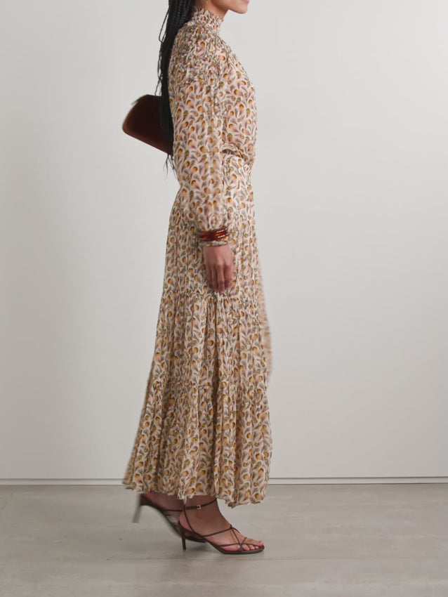 The Magdalena blouse by Ulla Johnson captures effortless elegance with its delicate ruffled silhouette and vibrant printed silk-crepon fabric. This refined piece features intricate detailing that elevates any ensemble, from casual daytime wear to sophisticated evening occasions. The breathable silk-crepon construction ensures comfort without compromising on style, while the thoughtfully placed ruffles add dimension and movement. Perfect for those who appreciate timeless design with a contemporary edge.