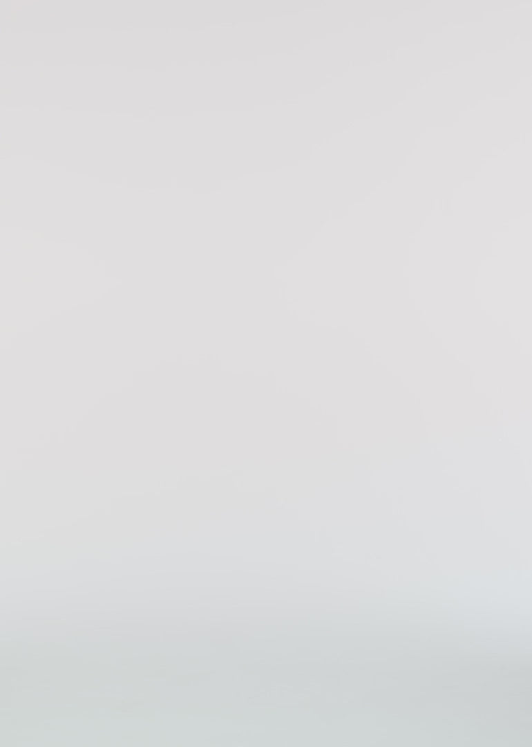 Indulge in luxury with the Blue Velvet Gown by Roland Mouret. The halter design exudes elegance, while the pleats and back slit add movement and flair. Perfect for prom, parties, or any special occasion, this floor length dress will make you feel like a celebrity. Get ready to turn heads in this stunning gown!