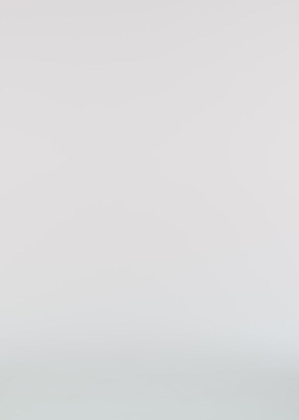 Indulge in luxury with the Blue Velvet Gown by Roland Mouret. The halter design exudes elegance, while the pleats and back slit add movement and flair. Perfect for prom, parties, or any special occasion, this floor length dress will make you feel like a celebrity. Get ready to turn heads in this stunning gown!