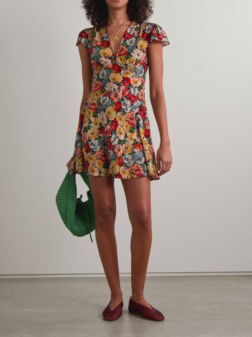 Experience effortless elegance with the Dianne floral-print mini dress by Doen. Crafted from luxurious silk crepe de chine, it features cheerful blooms enhanced by delicate burgundy embroidery along scalloped edges. The shirred shoulders and adjustable back ties create a flattering, tailored fit that highlights your waist, making it perfect for any occasion where you want to stand out with grace and charm.