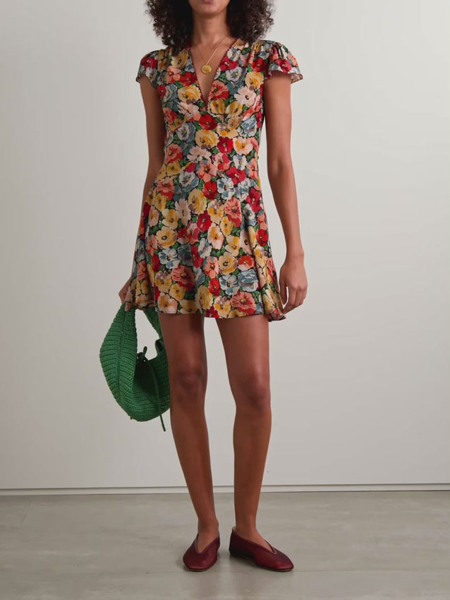 Experience effortless elegance with the Dianne floral-print mini dress by Doen. Crafted from luxurious silk crepe de chine, it features cheerful blooms enhanced by delicate burgundy embroidery along scalloped edges. The shirred shoulders and adjustable back ties create a flattering, tailored fit that highlights your waist, making it perfect for any occasion where you want to stand out with grace and charm.