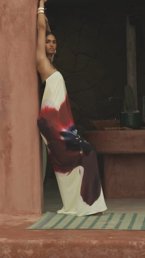 Indulge in the duality of femininity and toughness with the Antheia Maxi Dress. With its sleek silhouette and tough leather belt strap, make a bold statement. The vibrant colors of the orchid print add a touch of sensuality to this edgy piece. Elevate your style to new heights.