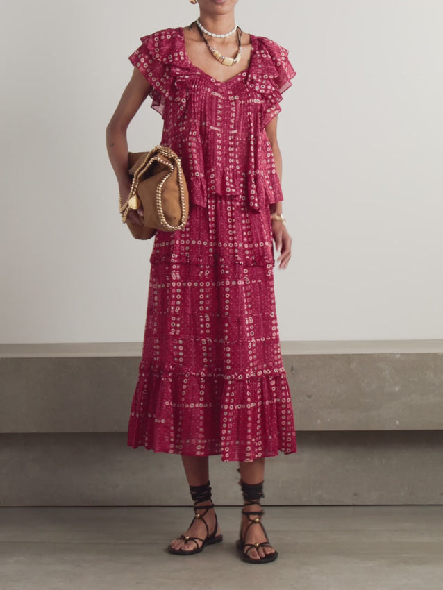 Elevate your wardrobe with this exquisite Marant Étoile blouse, crafted from lightweight organic cotton-voile that drapes beautifully against the skin. The delicate ruffled detailing adds romantic dimension, while the printed pattern brings visual intrigue to any ensemble. Perfect for layering or wearing solo, this sophisticated piece transitions seamlessly from day to evening, offering both comfort and refined style for the discerning woman.